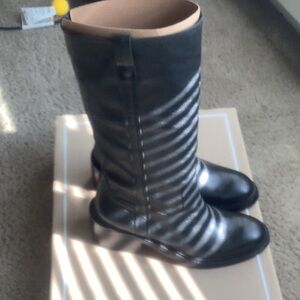 Tall leather black boots